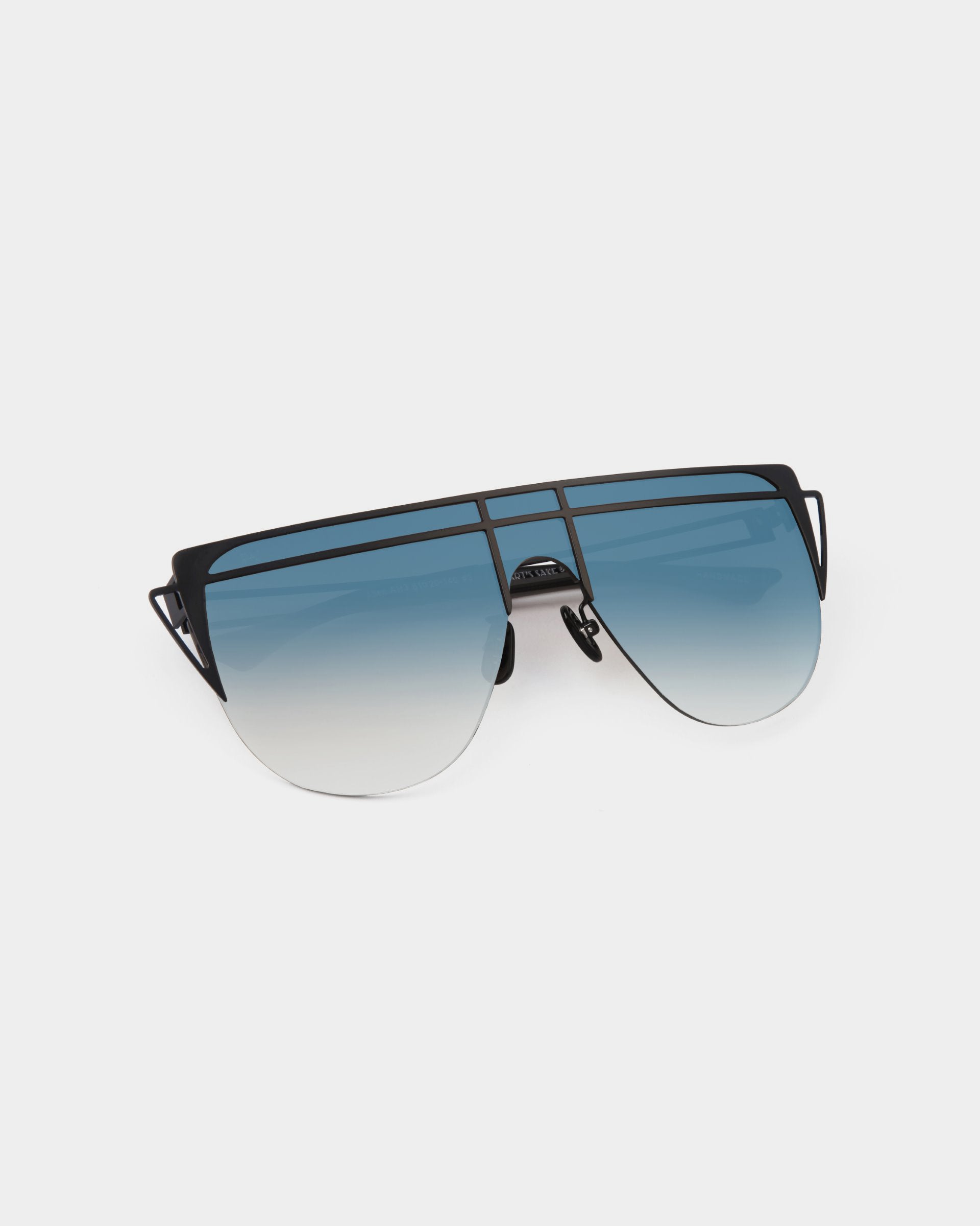 A pair of Alien sunglasses by For Art&#39;s Sake® with a black metal frame and gradient blue lenses. The design features a unique double bridge, minimal side arms, and offers UV protection, creating a modern and edgy look.