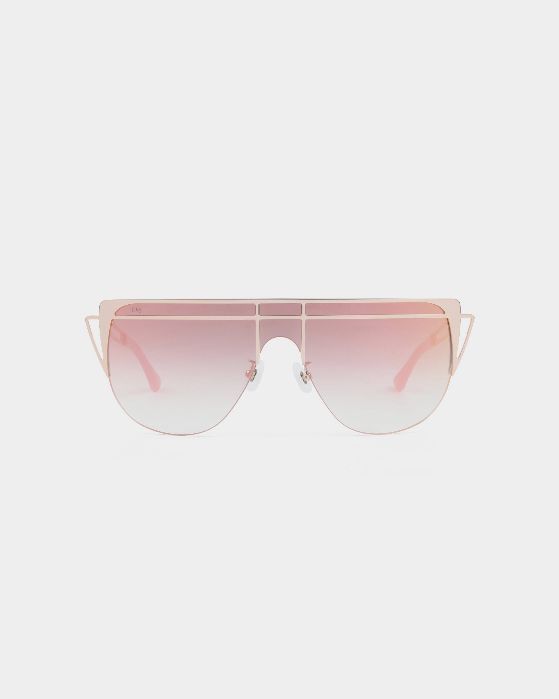 A pair of stylish, oversized avant-garde Alien sunglasses by For Art's Sake® with a thin handmade gold-plated stainless steel frame. The lenses are gradient pink, transitioning from light to dark. The frame features a double bridge and angular temple tips, adding a modern, geometric touch to the design. 100% UV protection is ensured.