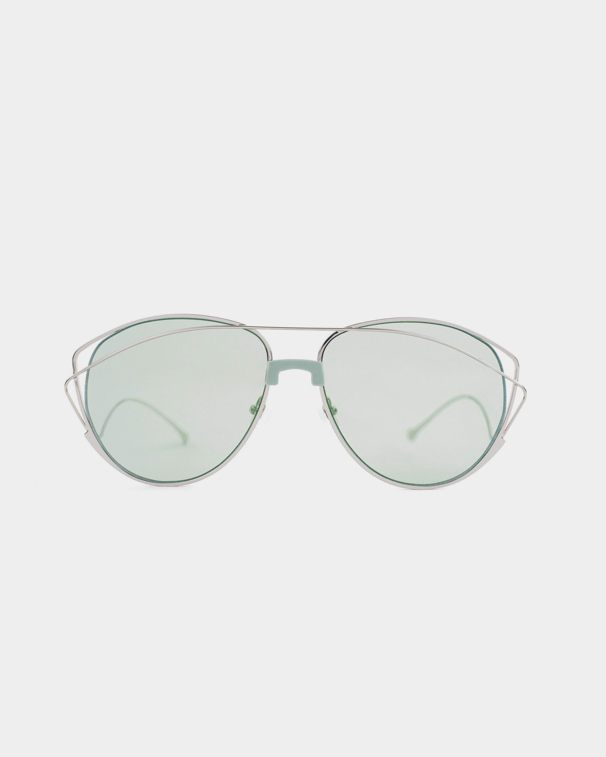 A pair of For Art&#39;s Sake® Dark Eyes aviator sunglasses with stainless steel frames and light green nylon lenses, featuring a unique double-layered design on the sides. The sunglasses offer 100% UV protection and are shown against a plain white background.