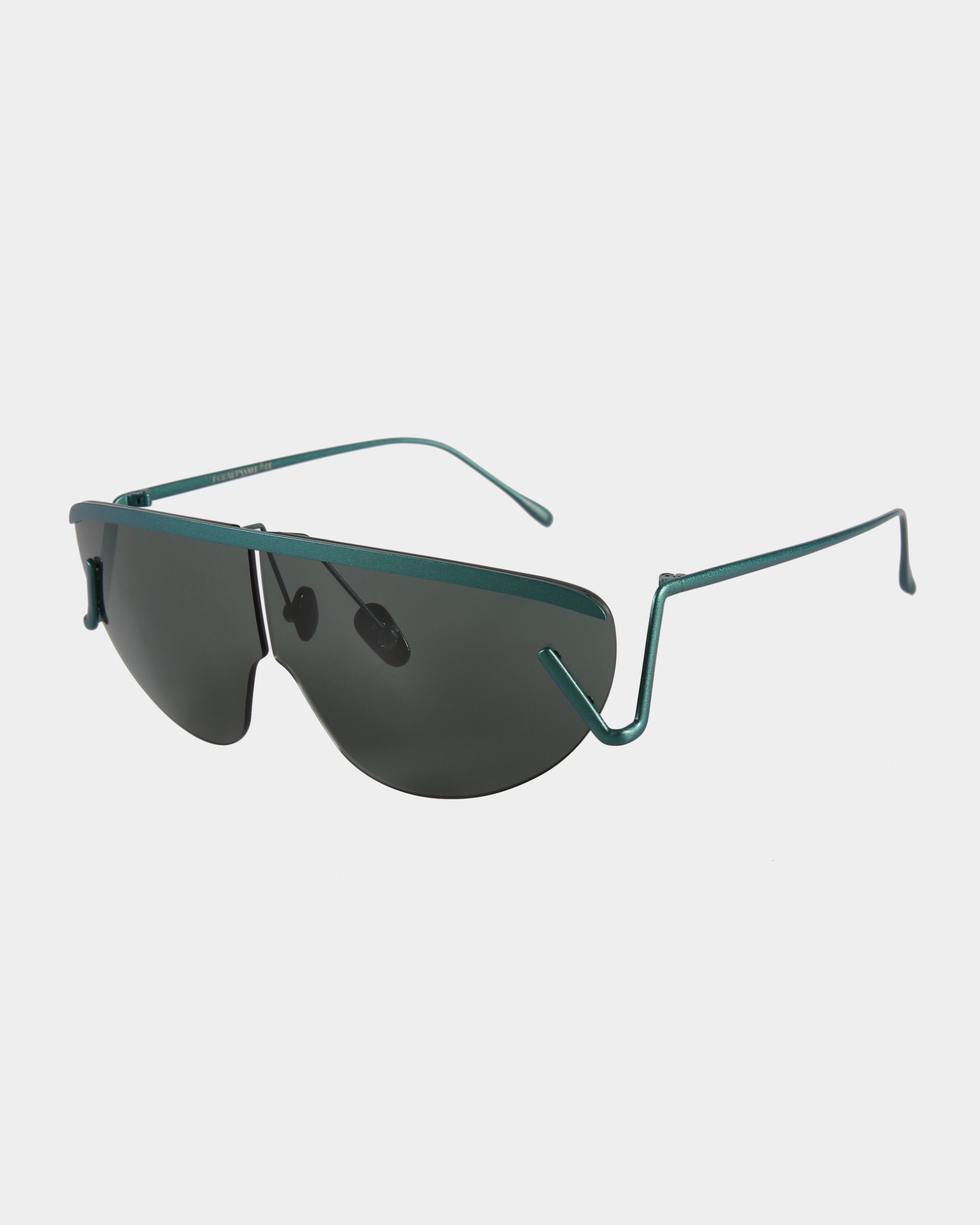 A pair of modern, stylish Air Green sunglasses by For Art's Sake® with dark lenses and a sleek, green metal frame. These ultralightweight UV protected sunglasses feature thin arms and a semi-rimless style with wrap-around temple tips, creating a fashionable and contemporary look.