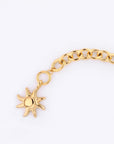 A Crescent Moon Bracelet by For Art's Sake®, measuring 20cm in length, features a sun-shaped charm and is displayed against a plain white background.