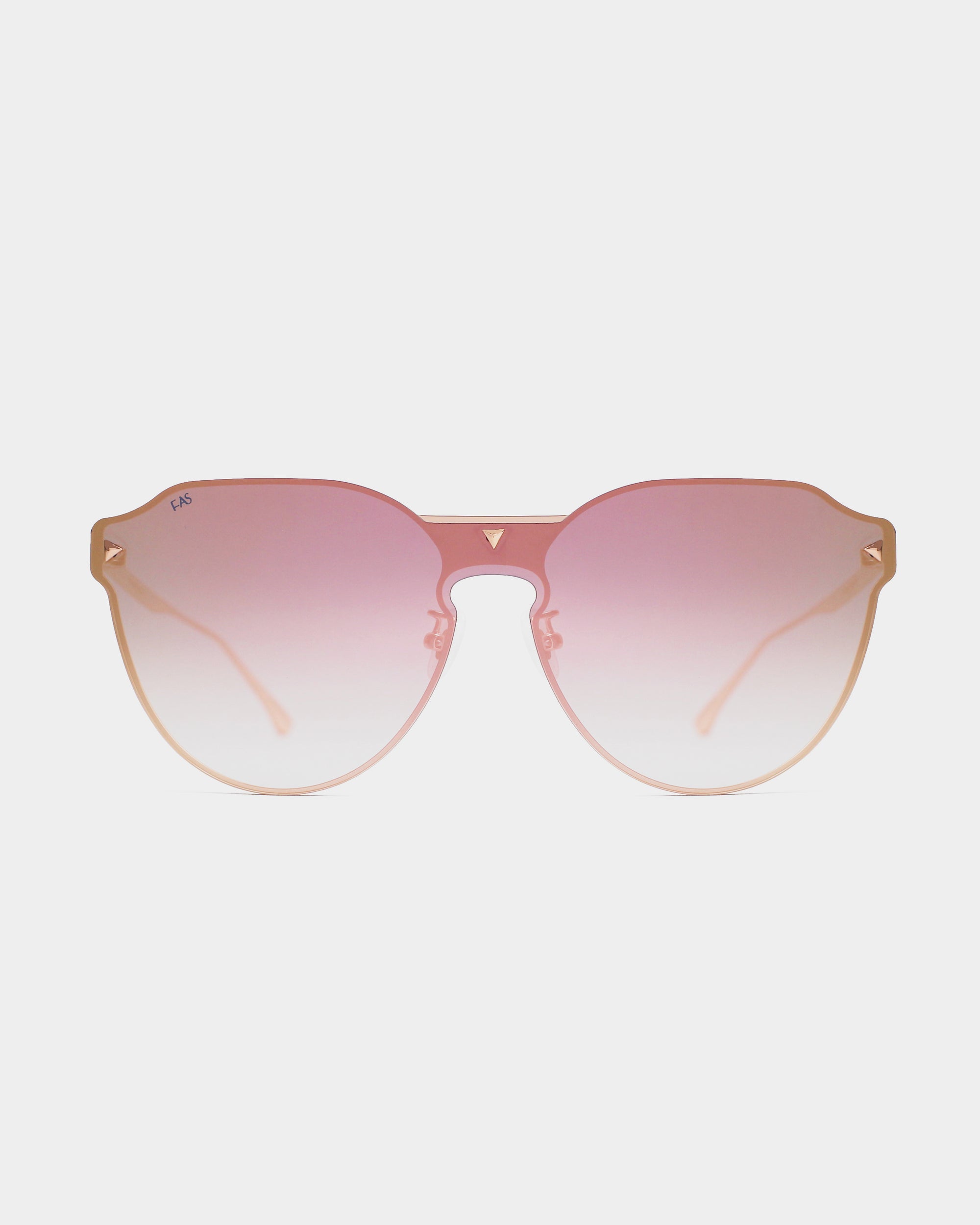 A pair of stylish **Error 404** sunglasses with a light peach frame and round gradient lenses that fade from pink at the top to light pink at the bottom. Featuring 18-karat gold plating, the bridge is subtle, and the arms are thin and elegant, matching the peach color of the frame. These exquisite sunglasses are crafted by **For Art's Sake®**.