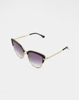 A pair of stylish For Art's Sake® Venus sunglasses with an 18-karat gold-plated black frame. The nylon lenses are gradient, transitioning from dark at the top to lighter towards the bottom. The thin arms feature black tips for added comfort. The background is plain white.