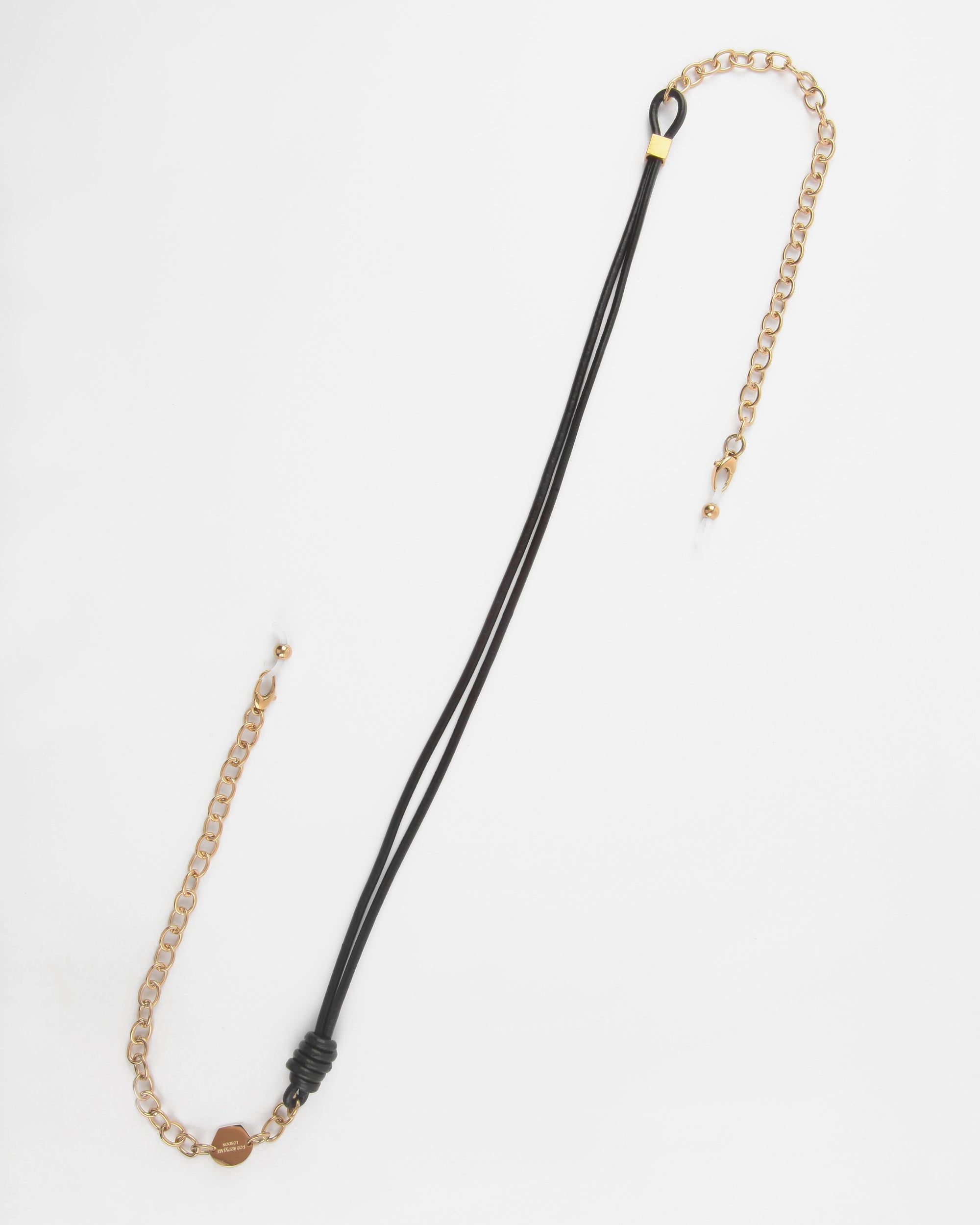 A stylish black leather necklace with 18-Karat gold links on one side and a premium leather adjustable cord on the other, both joined at a circular clasp. The Soho Glasses Chain by For Art's Sake® features small gold beads and a lobster clasp, giving it a modern, unique appearance. The background is plain white.