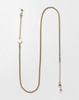 A delicate, 18k gold-plated **Mayfair Glasses Chain** with fine, intricate links and heart-shaped claw closures at both ends, designed to attach to eyeglasses. The chain also features adjustable extension links for a customizable fit. Displayed against a plain white background. Brand: **For Art's Sake®**