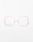 A pair of oversized eyeglasses featuring square-shaped lenses with a double frame design. The outer frame is made of thin, pink stainless steel, creating a modern and stylish look. The clear lenses are centered, and the background is plain white. These eyeglasses are called Candy by For Art's Sake®.