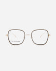 A pair of square-shaped, thin-framed eyeglasses with a gold metal frame and clear ultra-lightweight lenses. The brand name "For Art's Sake®" is printed on the inside of the left lens. The product name "Coconut" is associated with this stylish accessory. The background is plain white.