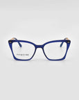 The Dion eyeglass frames by For Art's Sake® are blue, square-shaped frames with a subtle cat-eye design. They feature gold accents on the temples, provide UV protection, and are showcased against a light grey background.