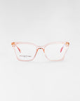 A pair of transparent pink, square-shaped eyeglasses, featuring UV Protection Lenses, is displayed against a plain white background. The product is the Dion by For Art's Sake®.