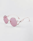 Diptych Sunglasses in Pink. Side View.