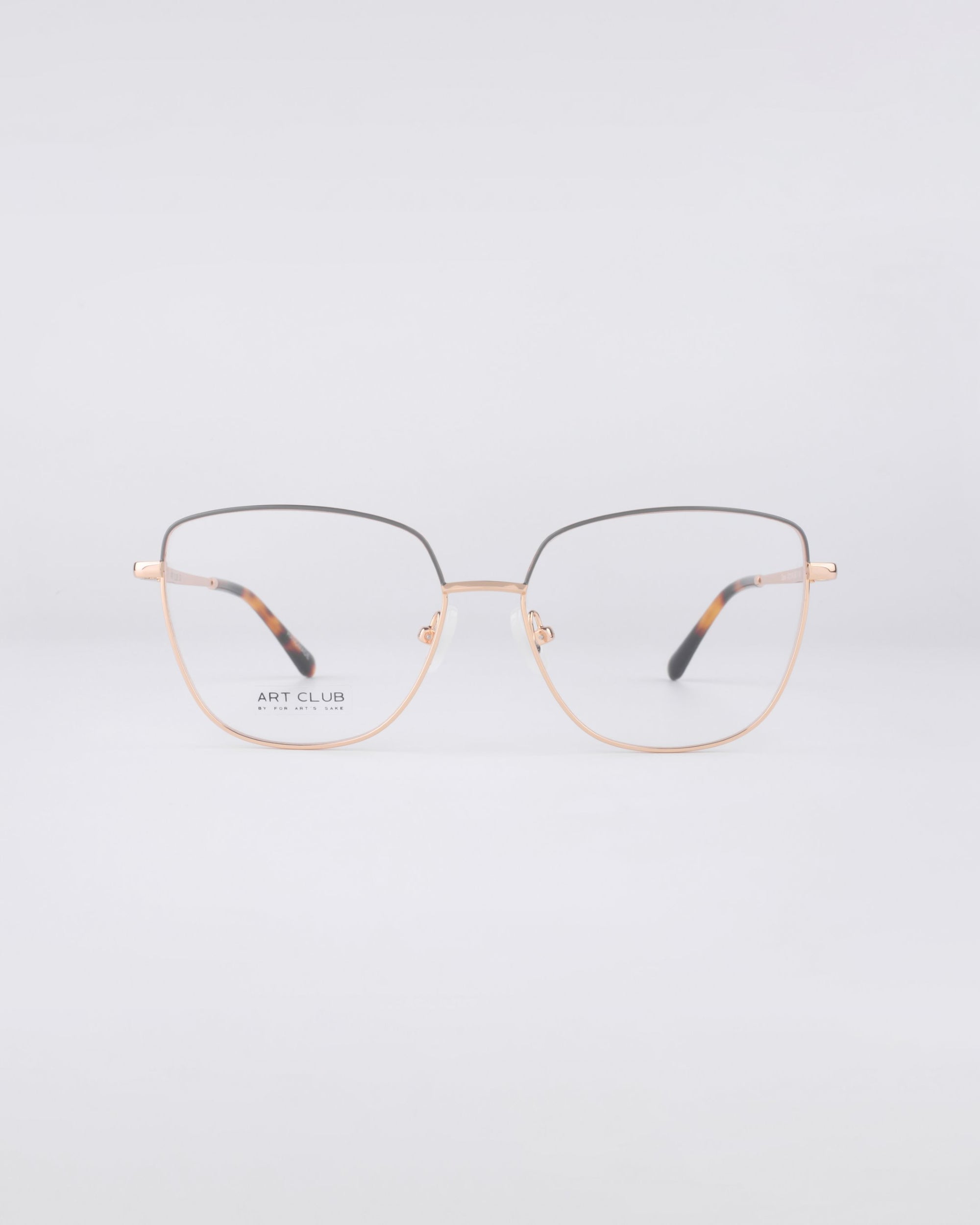 A pair of For Art's Sake® Dora frames featuring thin gold wire and blue light filter lenses is centered against a plain white background.