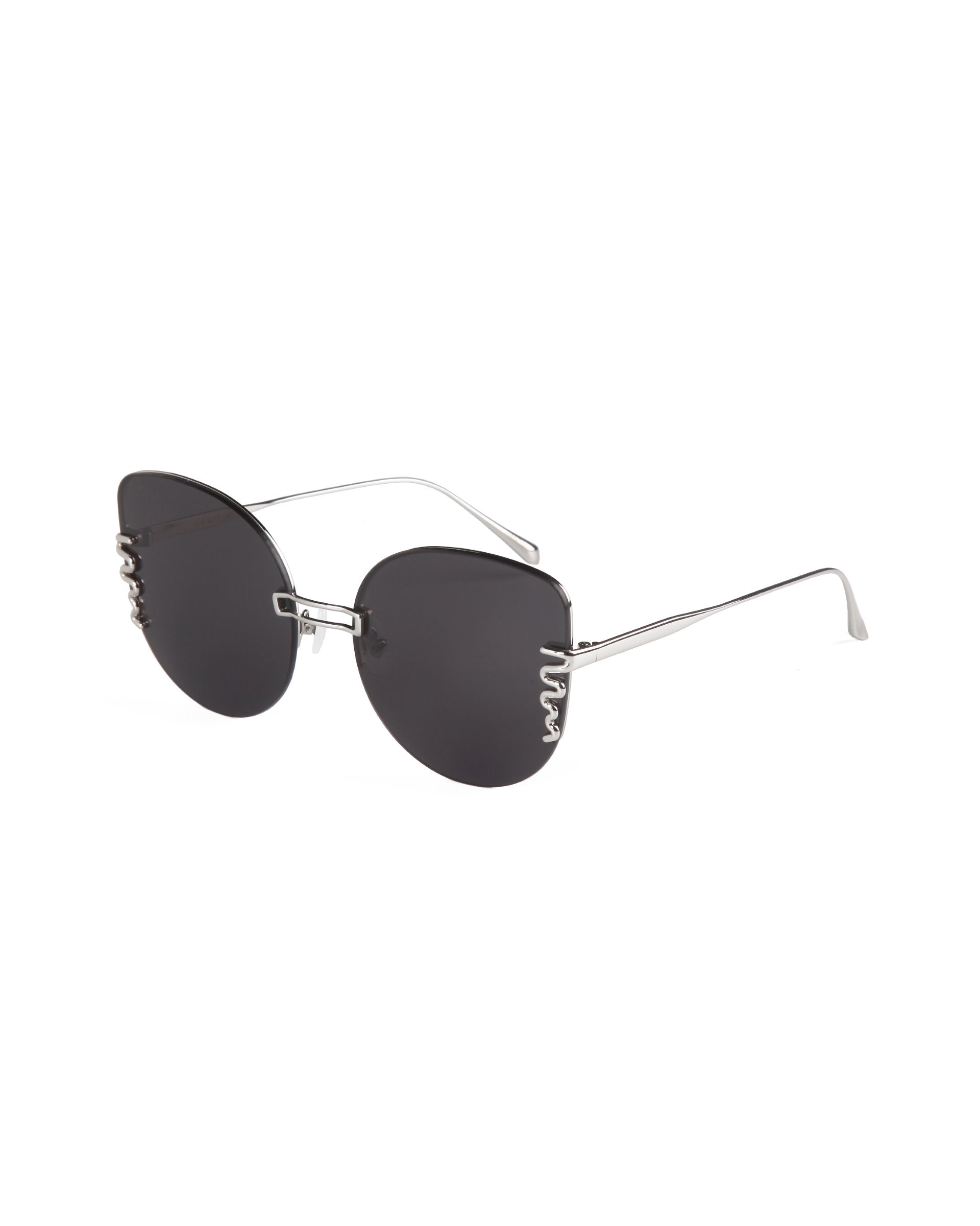 A pair of For Art&#39;s Sake® Girlboss sunglasses with round, dark-tinted lenses and thin, silver metal frames featuring a unique wavy design near the hinges. The slender arms extend straight back, and the adjustable nosepads ensure comfort, all while providing 100% UV protection.