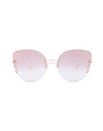 A pair of stylish oversized cat-eye sunglasses with large, round lenses featuring a gradient from pink at the top to translucent at the bottom. The frameless design includes a gold double bridge, delicate gold accents at the temples, and adjustable nosepads for a perfect fit: Girlboss by For Art's Sake®.