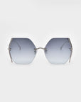 A pair of For Art's Sake® Generation sunglasses with gradient blue lenses is displayed against a plain white background. The sunglasses have thin, metallic silver frames and UV protection. The arms of the glasses are also metallic silver, and they feature subtle jadestone nosepads for added comfort.