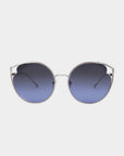 Introducing the Cat sunglasses by For Art's Sake®: a pair of stylish eyewear featuring round, gradient blue Nylon lenses framed by thin, metallic silver rims. The UVA & UVB-protected glasses' arms are also metallic silver, curving slightly at the ends for a modern and sleek appearance. Adjustable nose pads ensure a comfortable fit.