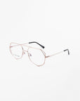 A pair of Genius Two metal-frame eyeglasses by For Art's Sake® with clear lenses featuring blue light filter technology. The frames are thin and gold-colored with black temple tips. The eyeglasses are photographed at a three-quarter angle on a white background.