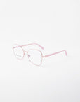 A pair of pink, metal-framed For Art's Sake® Grace prescription glasses with slightly oversized, rectangular lenses on a white background. The temples and temple tips are also pink, featuring clear nose pads and an 18-karat gold-plated brand logo visible on the left lens.