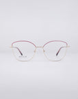 For Art's Sake® presents the Greta eyeglasses, showcasing thin, round frames. The top half is elegantly red, transitioning to a gold bottom half, and equipped with blue light filter lenses against a plain white background.