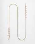 A For Art's Sake® Hackney Glasses Chain laid out in an S-shape against a white background. The chain features a series of interconnected oval links on one end and a small clasp on the other, accented with a stylish freshwater pearl detail.