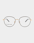A pair of round, thin-framed eyeglasses with gold rims and black temple tips. These stylish glasses feature adjustable nose pads for a perfect fit and a minimalist design with clear lenses. The small inscription "For Art's Sake®" graces the left lens, adding a unique touch to the Hailey model.