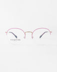 A pair of Ivy reading glasses by For Art's Sake® with a thin gold bridge and pink rims. The earpieces are black with gold accents near the hinges. Featuring blue light filter lenses, the words "For Art's Sake® London" are printed on the left lens. The background is plain white.