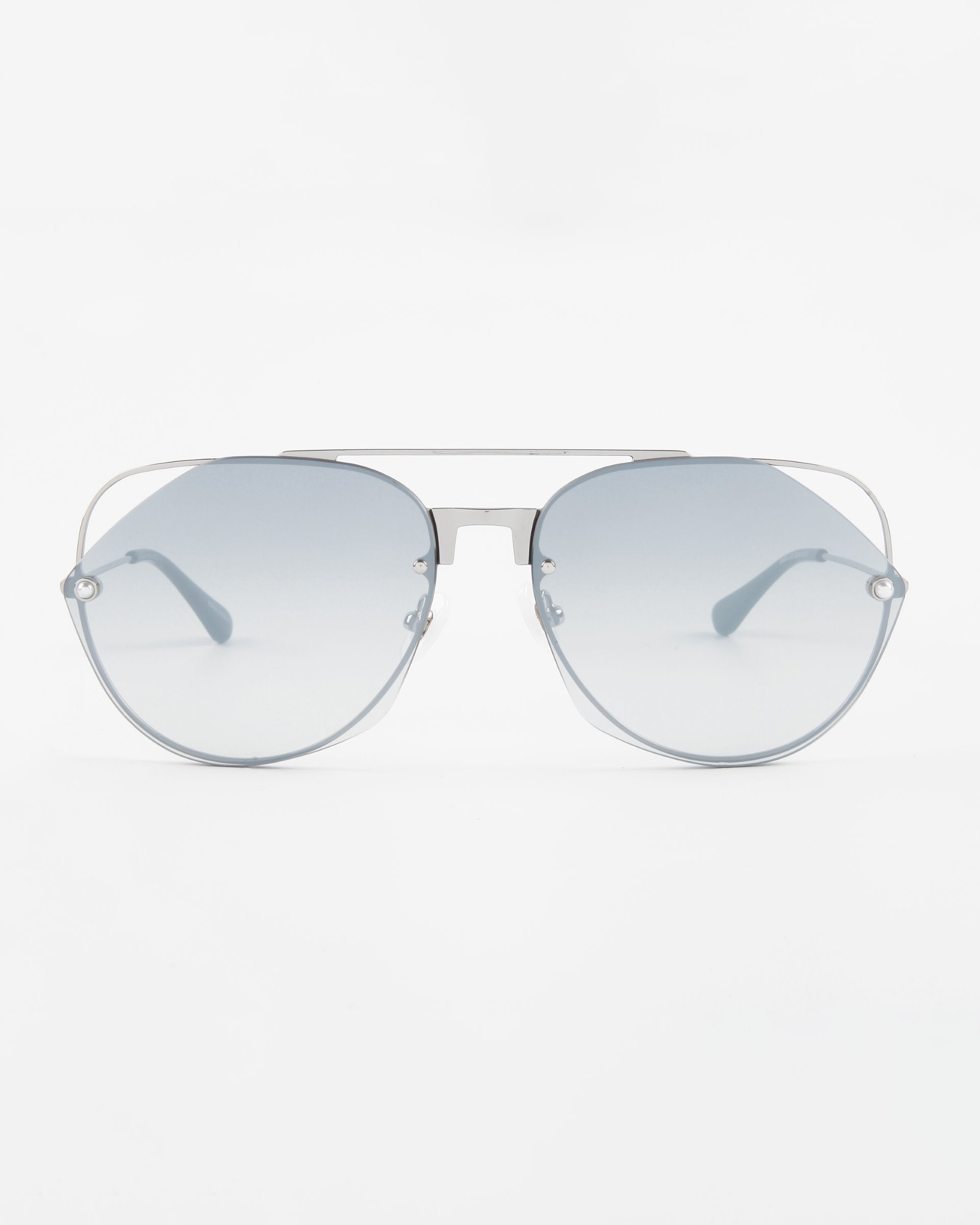 A pair of stylish For Art&#39;s Sake® Casino aviator sunglasses with light blue gradient nylon lenses and a thin silver metal frame. The sunglasses boast UV protection and a double bridge design, displayed against a white background.