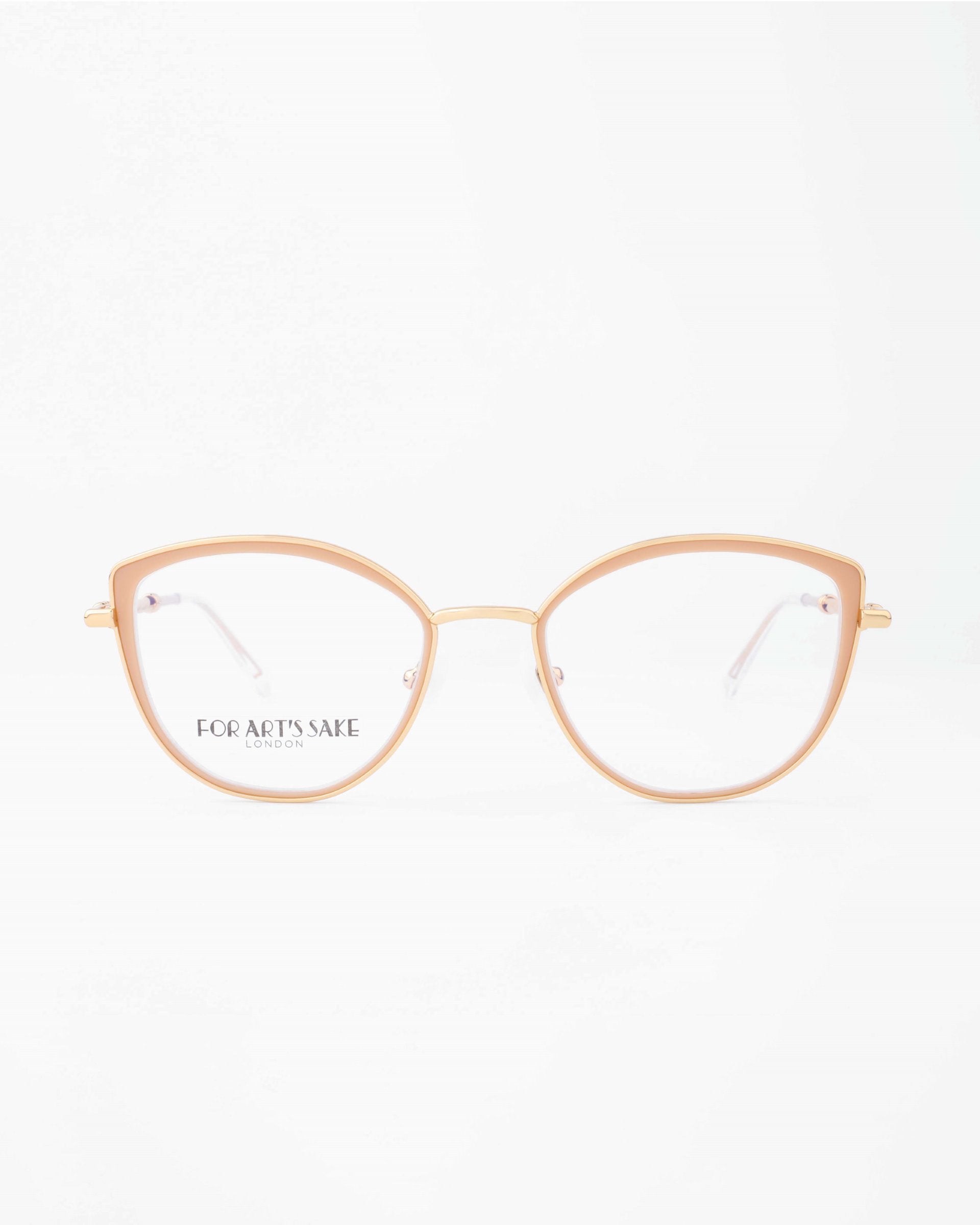 A pair of stylish For Art's Sake® Julie eyeglasses with light pink, thin frames. The lenses are large and round, featuring a subtle blue light filter and an inscription on the left lens that reads "FOR ART'S SAKE LONDON." The background is a plain, white surface.
