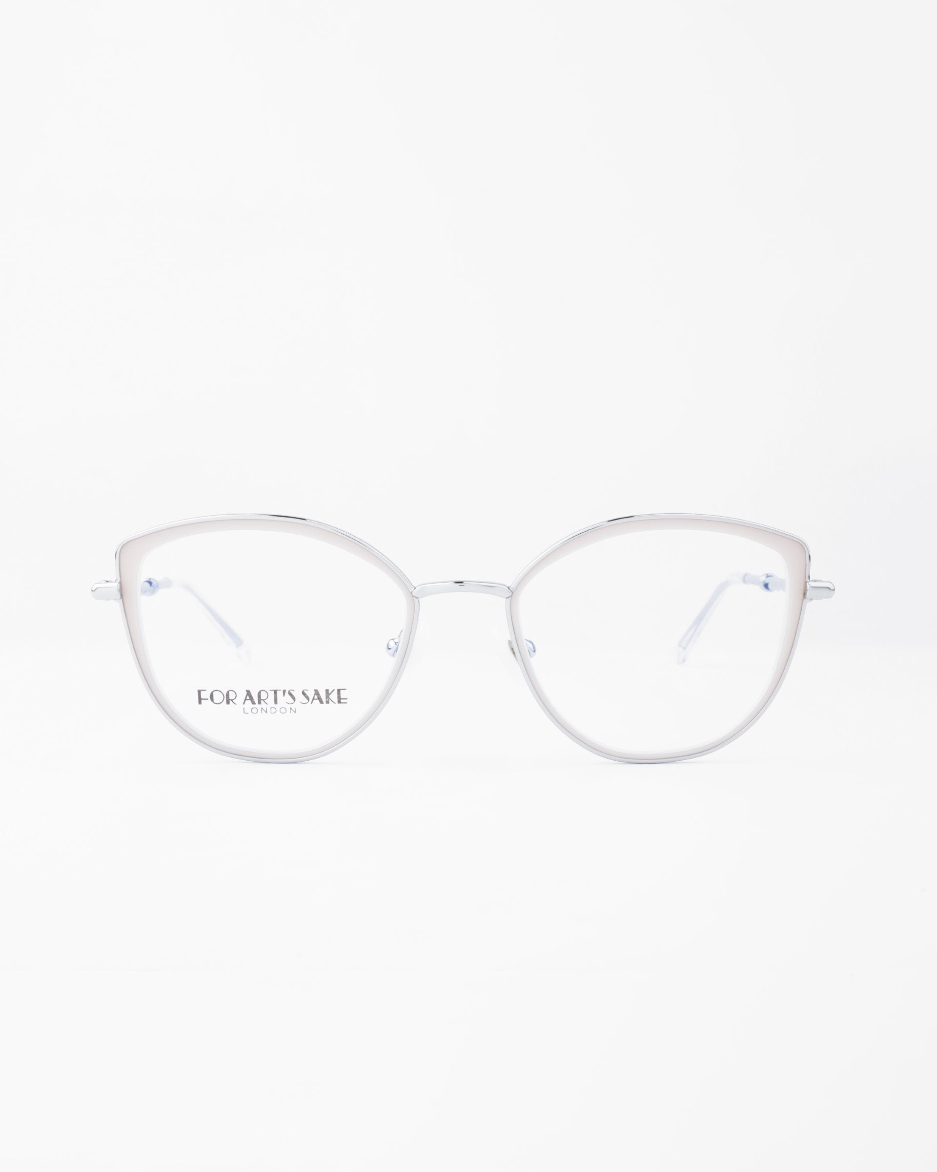 A pair of metallic cat-eye glasses with clear lenses and thin frames on a white background. The left lens has &quot;For Art&#39;s Sake®&quot; printed in small text. These elegant Julie spectacles also feature an 18-karat gold-plated finish.