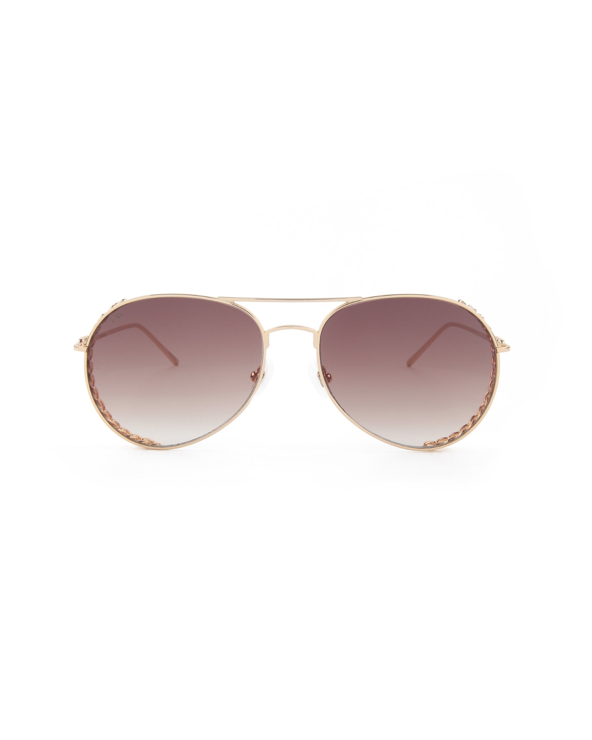 A pair of aviator-style Links sunglasses from For Art&#39;s Sake® with gold-plated stainless steel frames and gradient brown nylon lenses. The arms feature a partial gold chain link design near the hinges. The sunglasses are displayed on a white background.