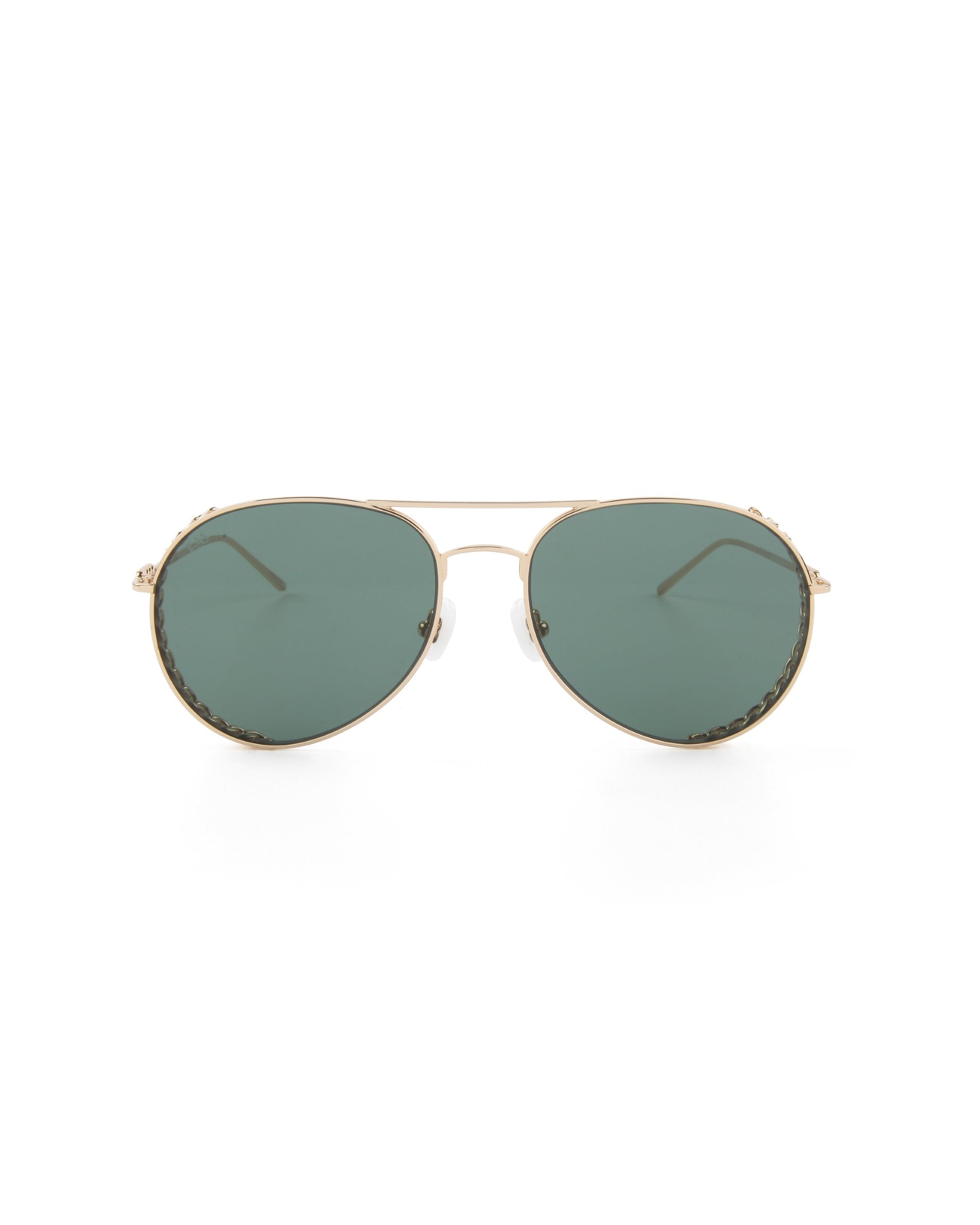 A pair of Links by For Art's Sake® with a thin gold-plated stainless steel frame and dark green Nylon lenses. The sunglasses feature a double bridge design and adjustable nose pads. The temples are gold with curved ends for a secure fit, while the large, slightly rounded lenses complete the classic look.