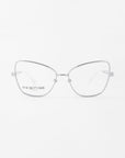 Clear cat-eye eyeglasses with thin, silver metal frames and the phrase "FOR ART'S SAKE LONDON" inscribed on the left lens. Featuring prescription lenses, these chic Lady by For Art's Sake® glasses are set against a plain white background.