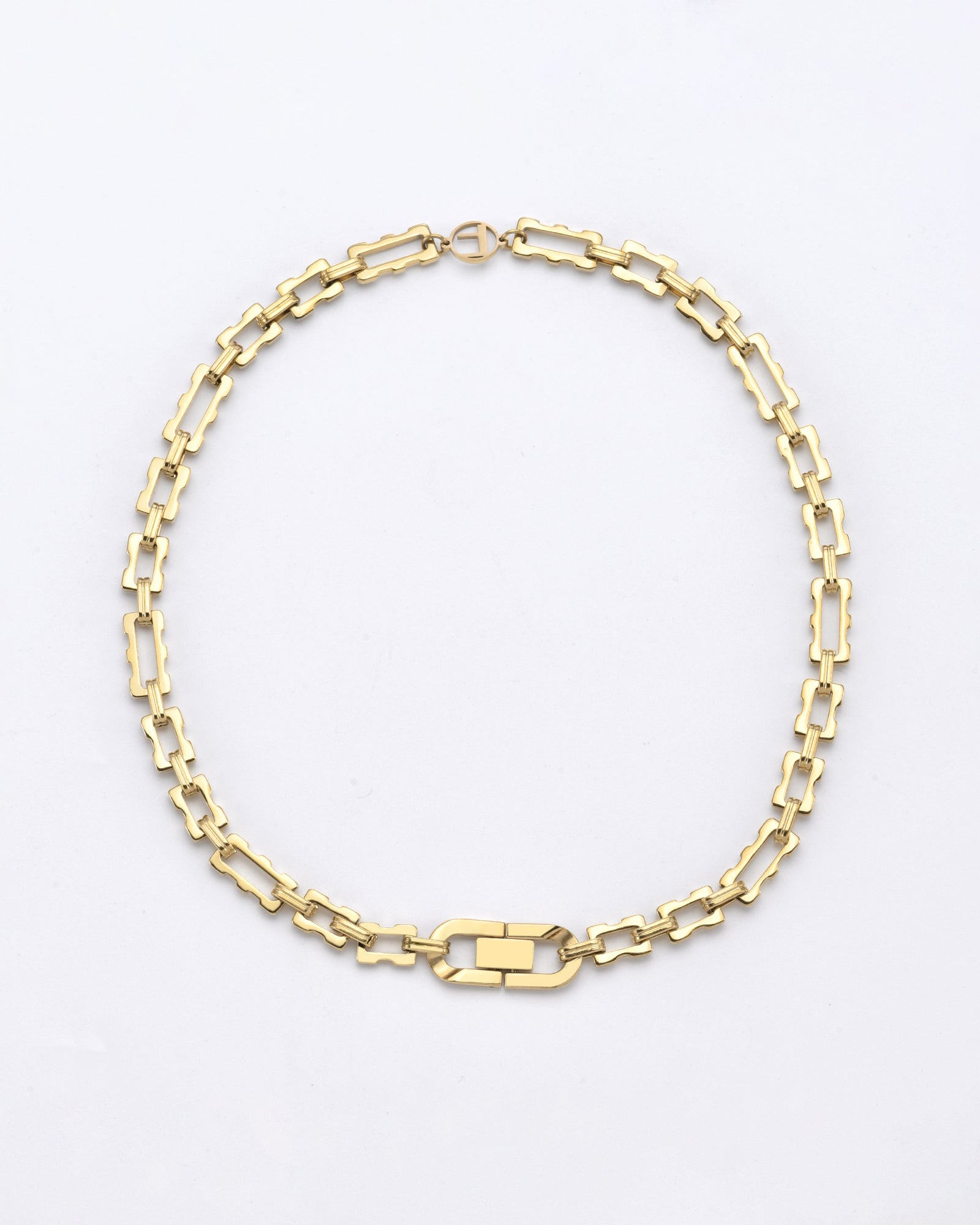 A 24k gold-plated chain necklace is displayed on a white background. The **Links Necklace Gold** by **For Art's Sake®** features interlocking rectangular links with a larger, distinct clasp at the center.