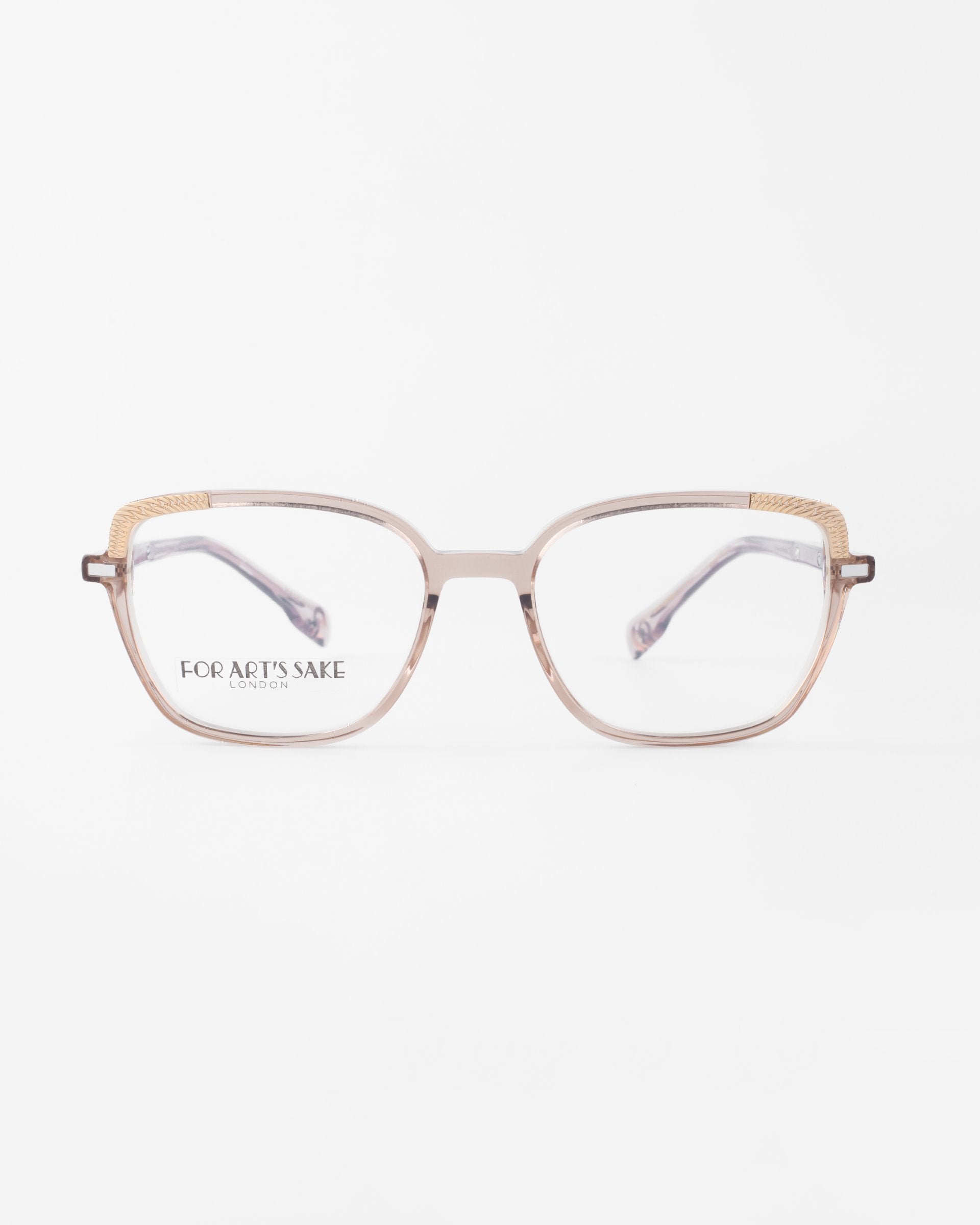 A pair of stylish eyeglasses with prescription lenses and a beige frame. The temples feature an elegant 18-karat gold-plated accent near the front. The brand name &quot;For Art&#39;s Sake®&quot; is visible on the left lens. The background is plain white.

Product Name: Mimosa