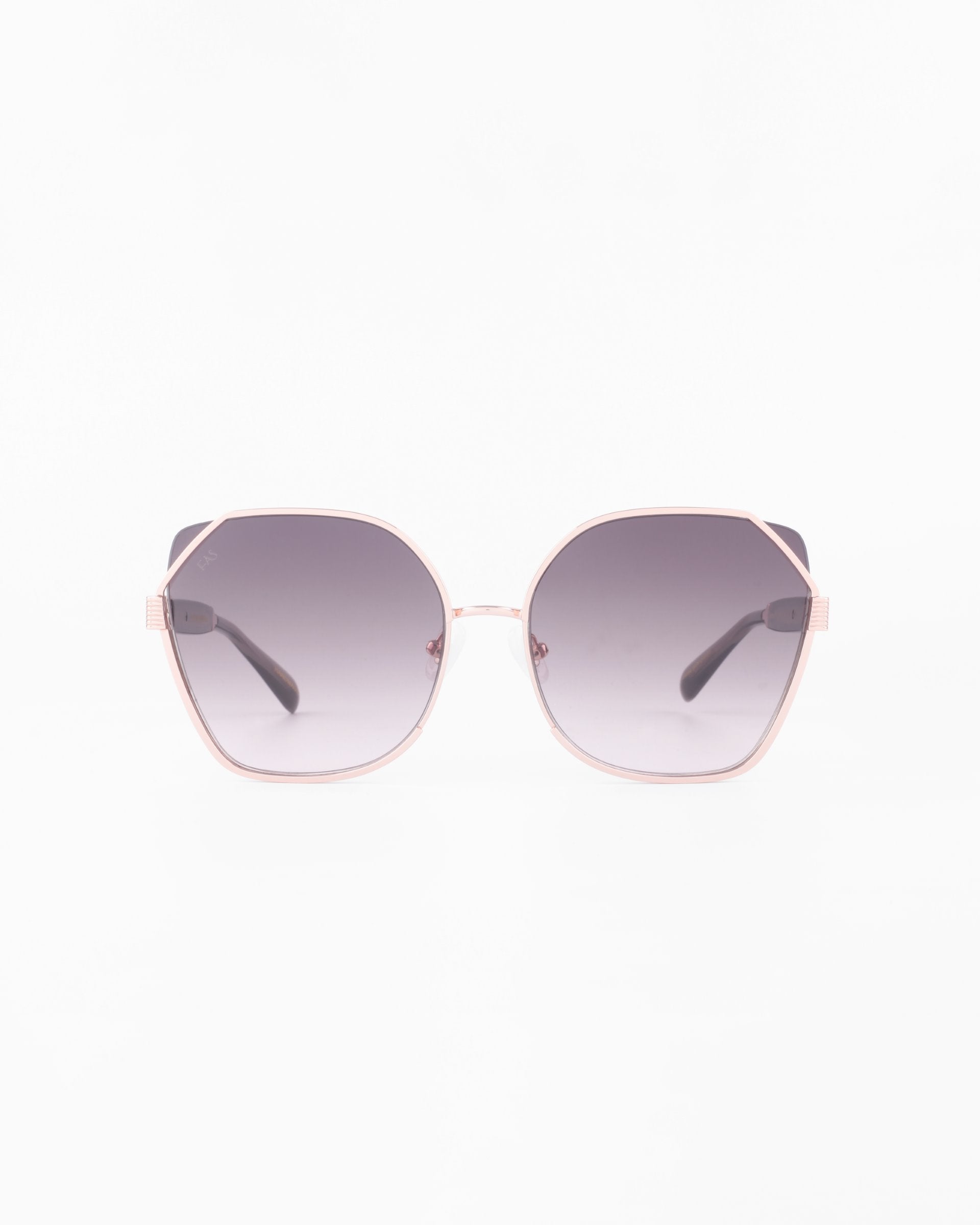 A pair of Montage sunglasses with large, round lenses and a thin, gold-plated stainless steel frame by For Art&#39;s Sake®. The gradient-tinted lenses offer 100% UVA &amp; UVB protection, transitioning from a darker shade at the top to a lighter shade at the bottom. The arms are slender and black.