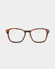 A pair of rectangular, brown tortoiseshell eyeglasses with clear lenses is centered against a plain white background. The frames have small silver embellishments near the hinges on the front and feature adjustable nose pads for comfort. These stylish Morris glasses by For Art's Sake® are perfect for those seeking prescription service.
