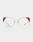 A pair of stylish Brisky eyeglasses with gold metal rims and round lenses. The top part of the frames features a pink and black marbled pattern, and the brand name "For Art's Sake®" is visible on the left lens. These glasses come with a blue light filter for extra eye protection.