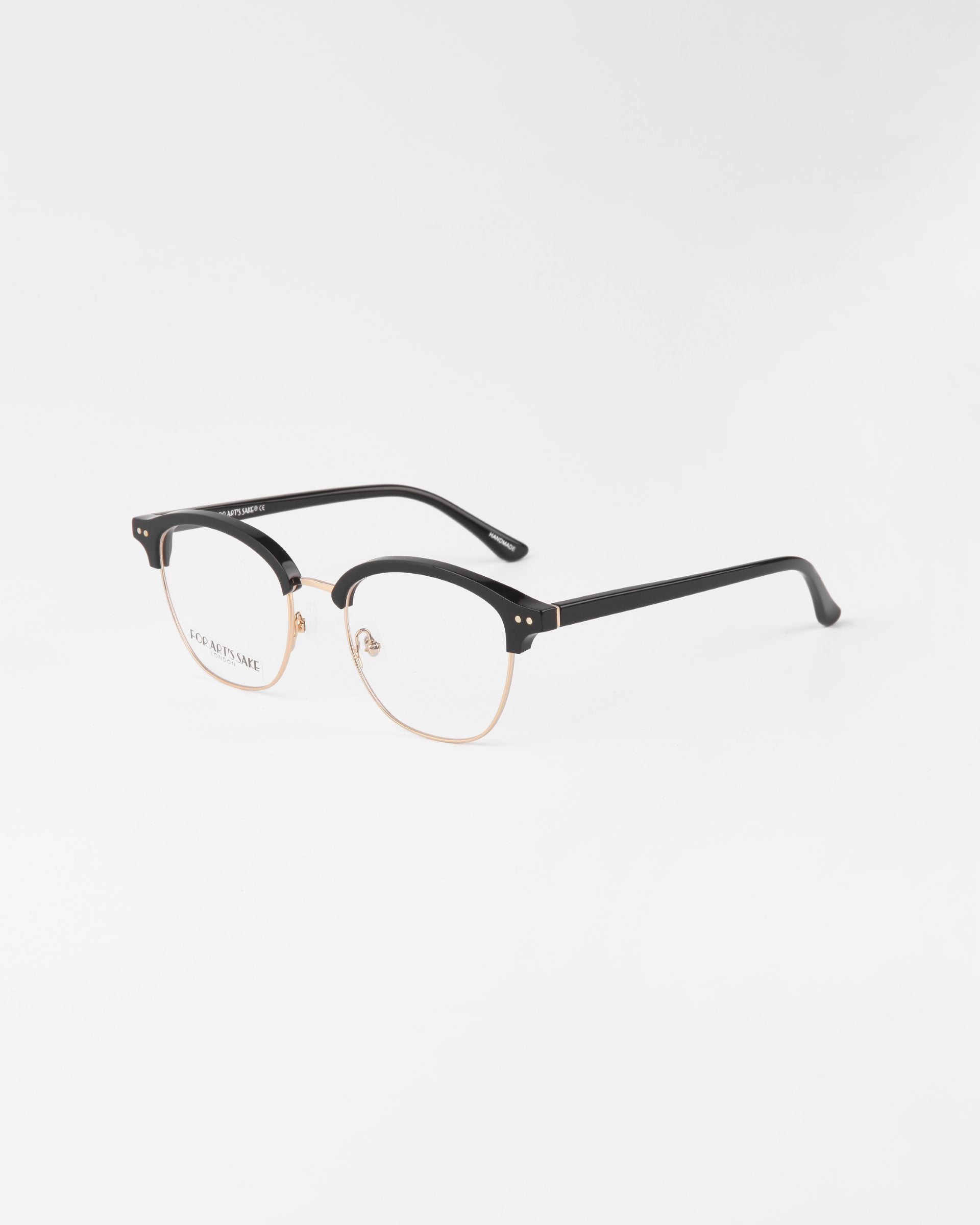 A pair of stylish For Art&#39;s Sake® Painkiller eyeglasses with black upper frames and golden rims, displayed against a white background. The temples are framed in black, and the bridge and nose pads are metallic gold, adding a chic and elegant touch to the overall design. These glasses also come with UV protection.