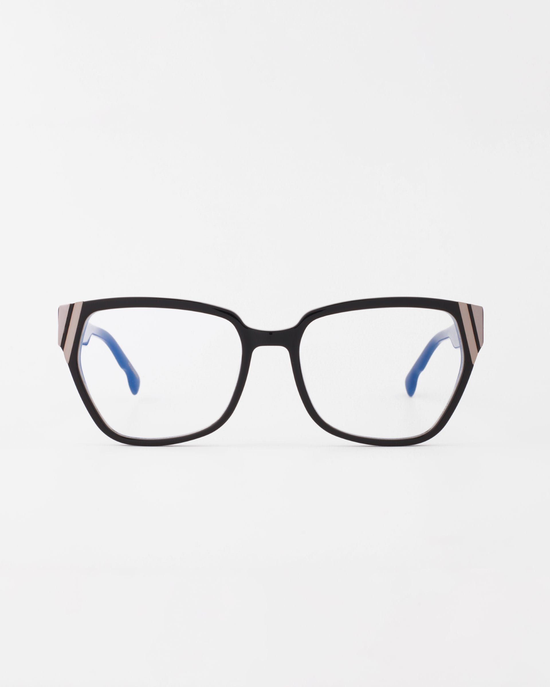 The Below Zero by For Art's Sake® are unisex rectangular eyeglasses featuring a black frame with modern flair and metallic arm accents. Inside, the bright blue creates striking contrast, all against a plain white background.