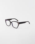 Below Zero by For Art's Sake®: Black rectangular eyeglasses feature a modern flair with a subtle gold accent on the frame, set against a plain white background.