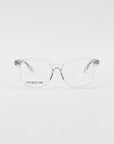 A pair of transparent For Art's Sake® optical glasses with rectangular lenses is centered against a plain white background. The text "FOR ART'S SAKE" appears on one lens near the bridge. The Cadenza glasses have a minimalist and modern design, offering an option for prescription service.