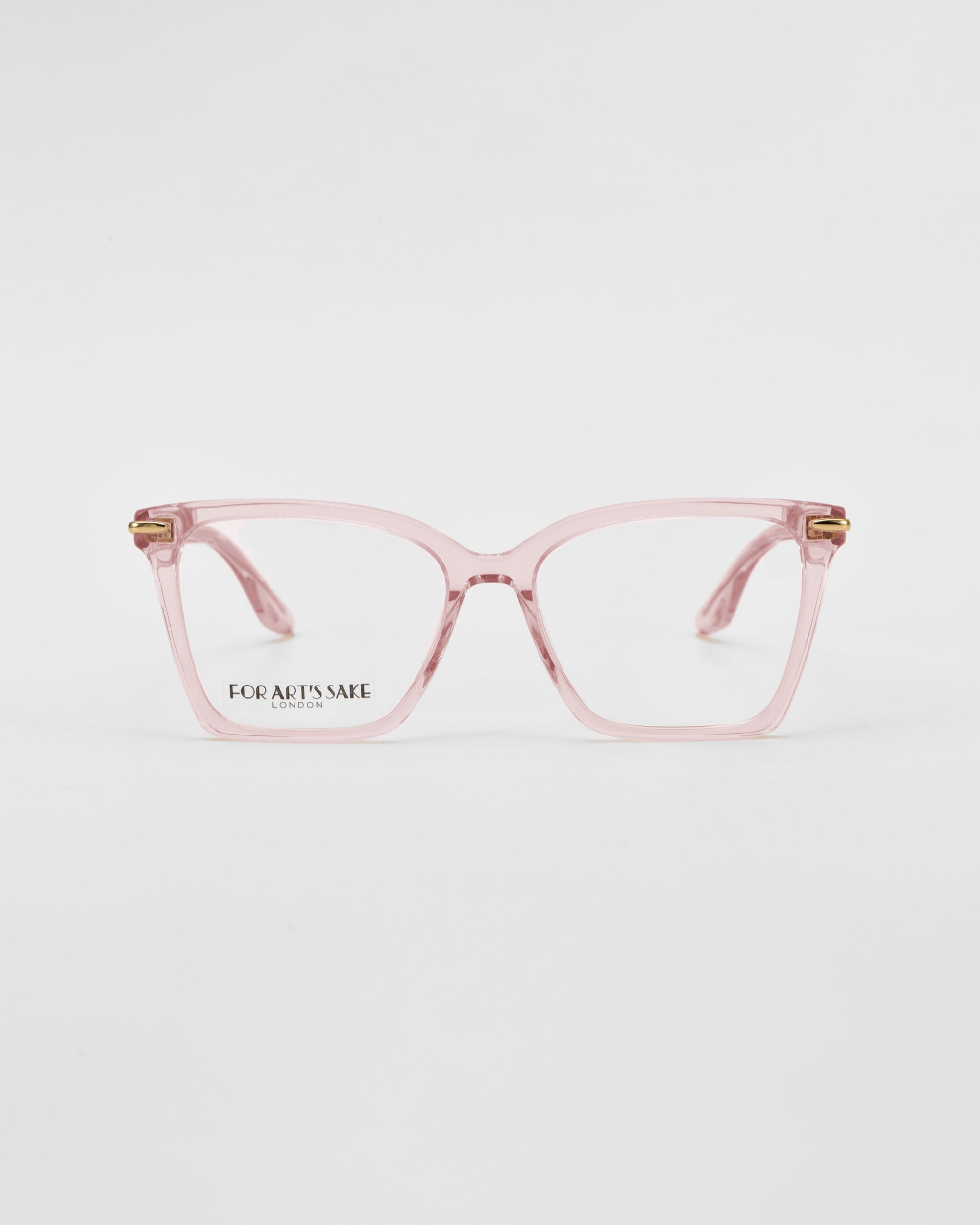 A pair of light pink eyeglasses with a slight cat-eye shape and gold accents on the temples, crafted from glossy acetate. The phrase &quot;For Art&#39;s Sake® Azure&quot; is visible on the inner side of one of the lenses. The background is plain white.