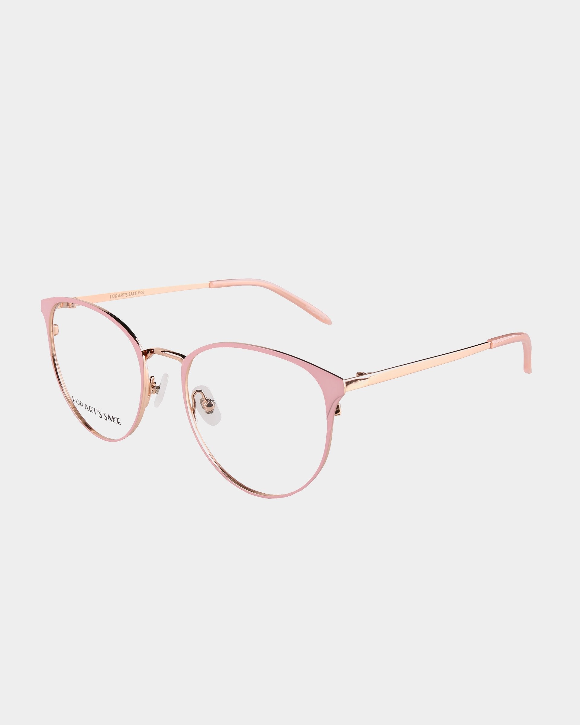 A pair of stylish Olivia eyeglasses with pink metallic frames and clear lenses, featuring a slender rose gold finish extending to the curved ear pieces for comfort. These chic glasses by For Art&#39;s Sake® also offer UV Protection, perfect for everyday wear. Set against a plain white background.