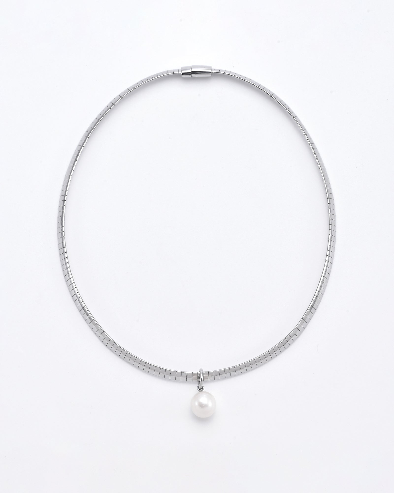A minimalist For Art's Sake® Orbit Necklace Silver with a single, round freshwater pearl pendant. The necklace is closed with a sleek metal clasp and is displayed against a plain white background.