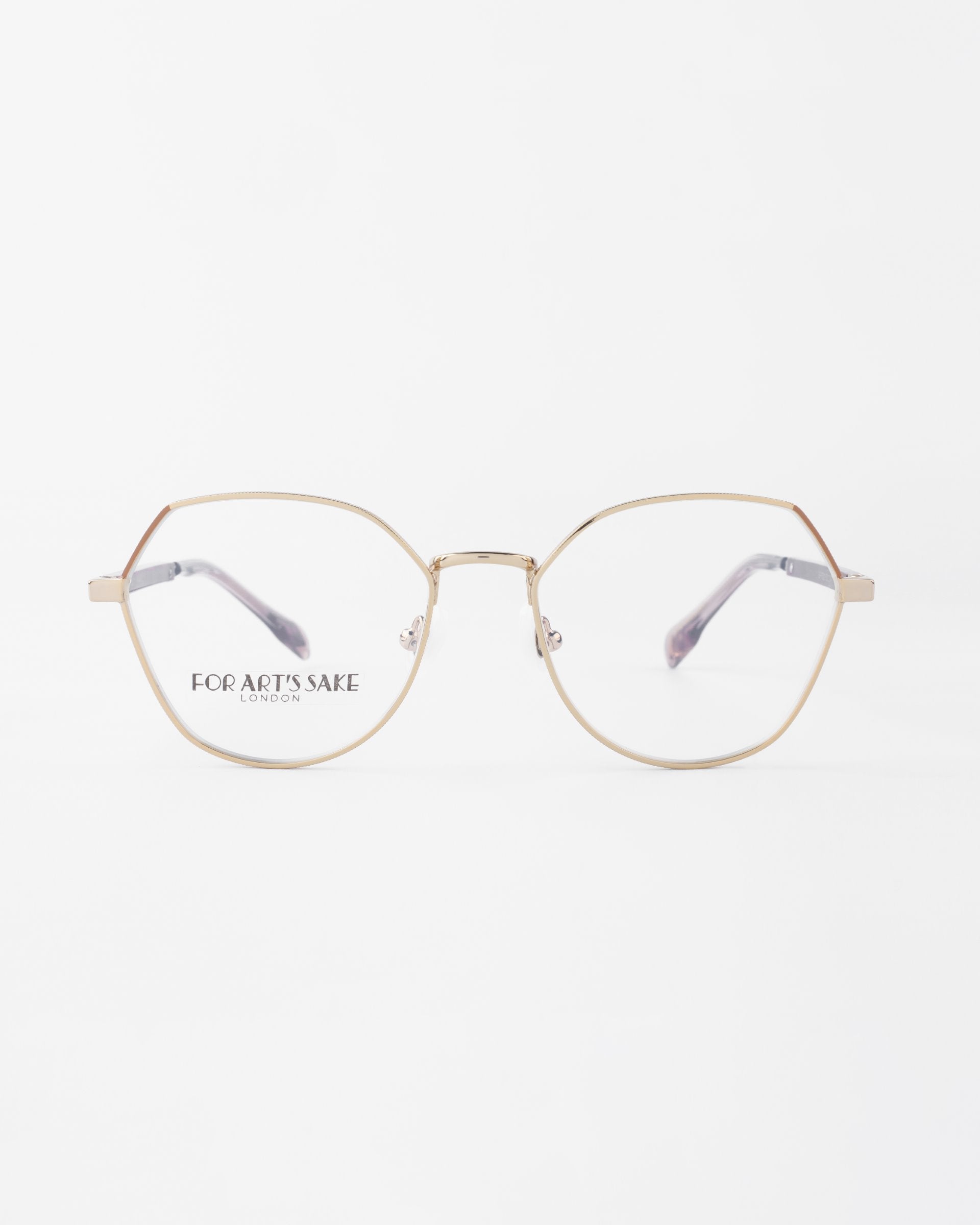 A pair of Orchard eyeglasses with a thin, 18-karat gold-plated frame and round, clear lenses. The brand name "For Art's Sake®" is visible on the left lens. The background is plain white, emphasizing the delicate design of these elegant glasses, which also feature optional prescription lenses.