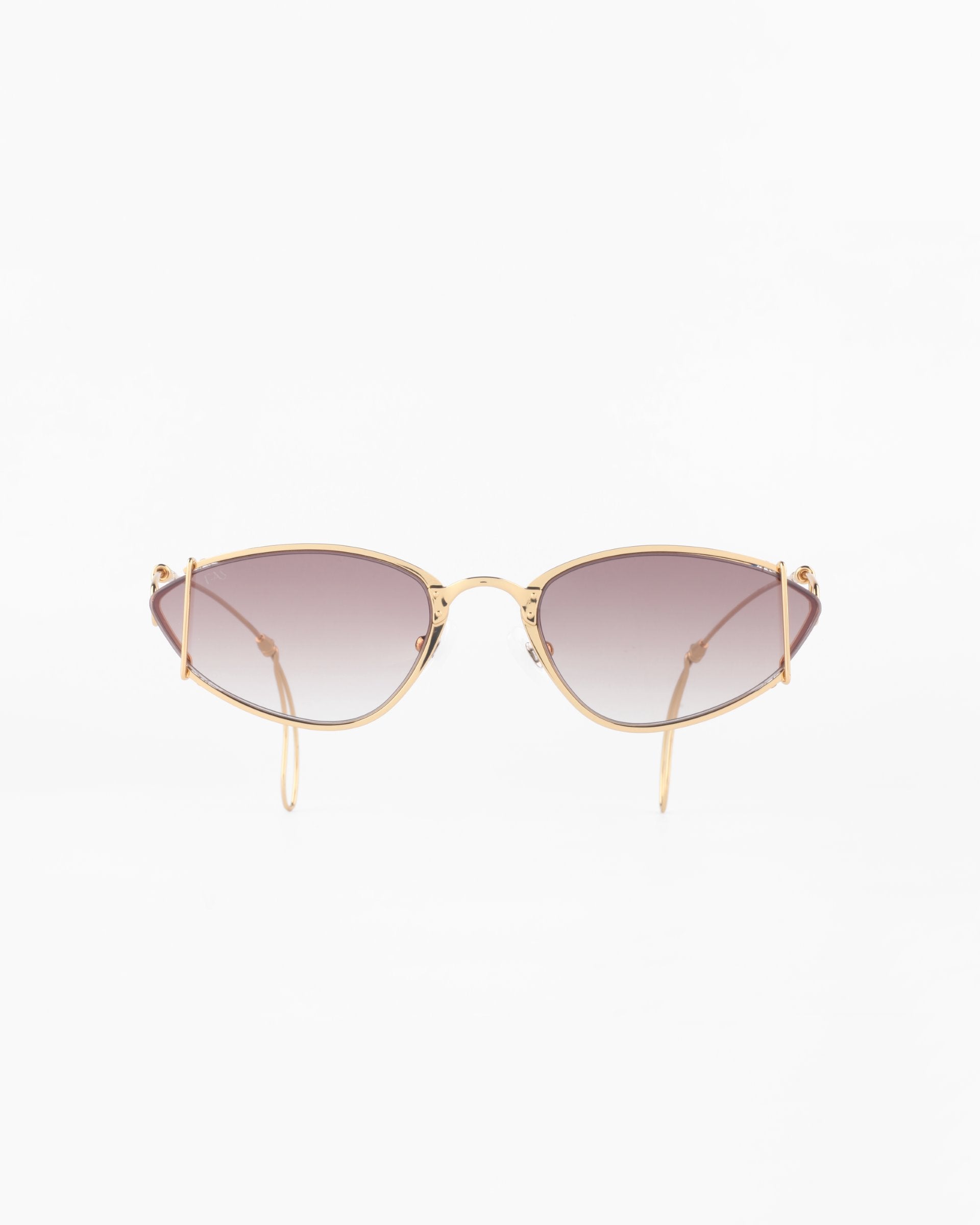 A pair of stylish, 18-karat gold-plated sunglasses with brown-tinted lenses. The Ornate by For Art's Sake® sunglasses have a sleek, modern design and feature thin wire temples. They offer 100% UVA & UVB protection and are set against a plain, white background.