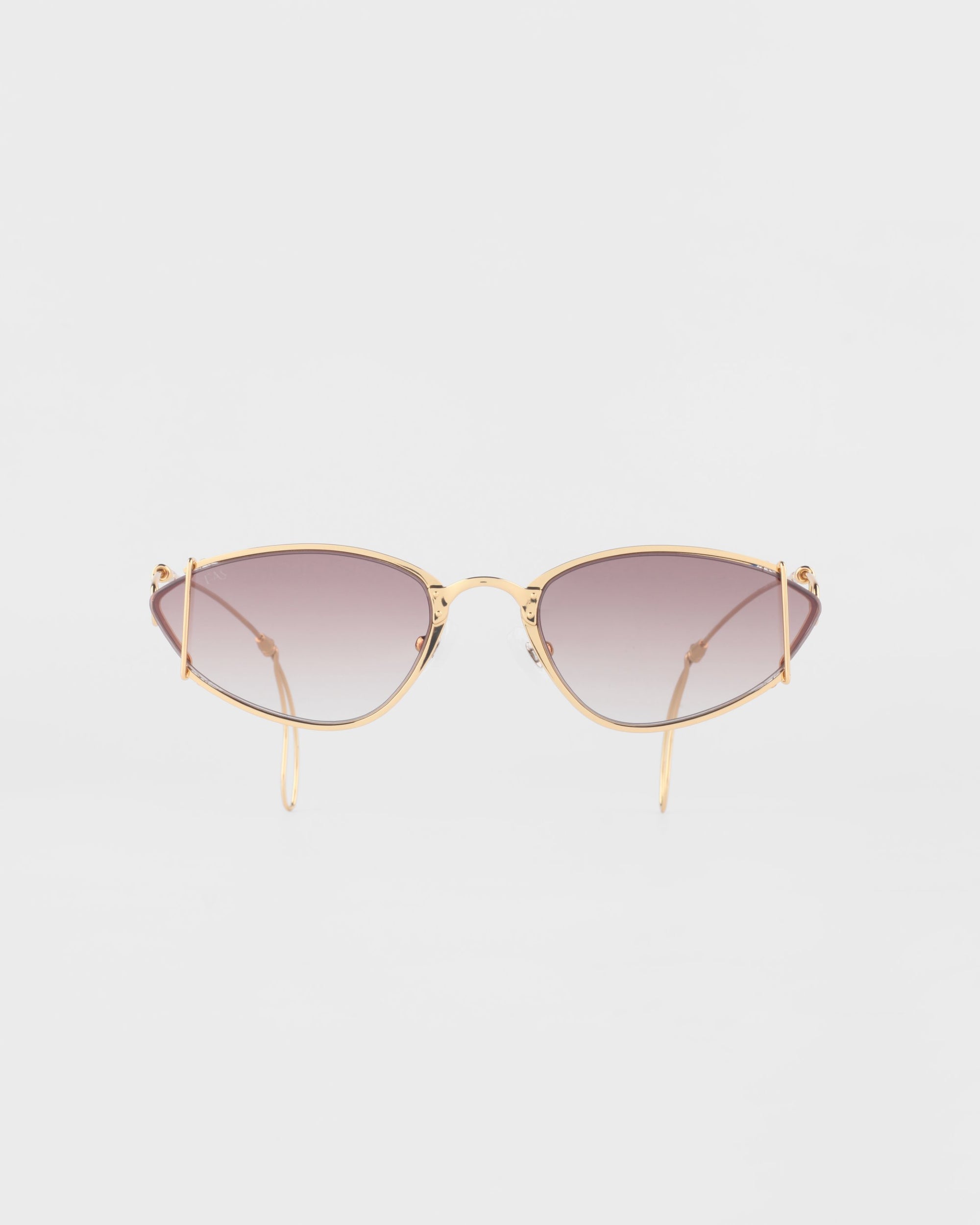 A pair of stylish For Art's Sake® Ornate sunglasses with 18-karat gold-plated frames and tinted lenses shown against a plain white background. The sunglasses have a sleek, modern design with slightly angular cat-eye shaped lenses, thin curved arms, and an anti-reflective coating for optimal clarity.