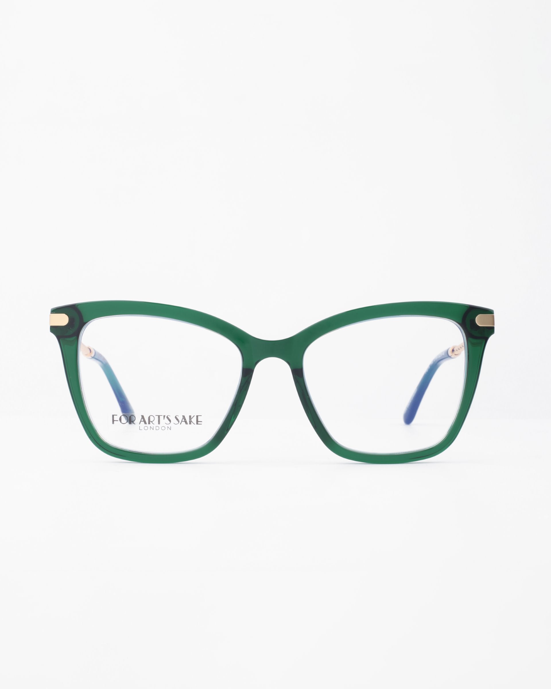 A pair of green-rimmed Paris Two eyeglasses by For Art&#39;s Sake® displayed against a plain white background. The glasses have a square frame with blue temple tips and feature a blue light filter for added protection.