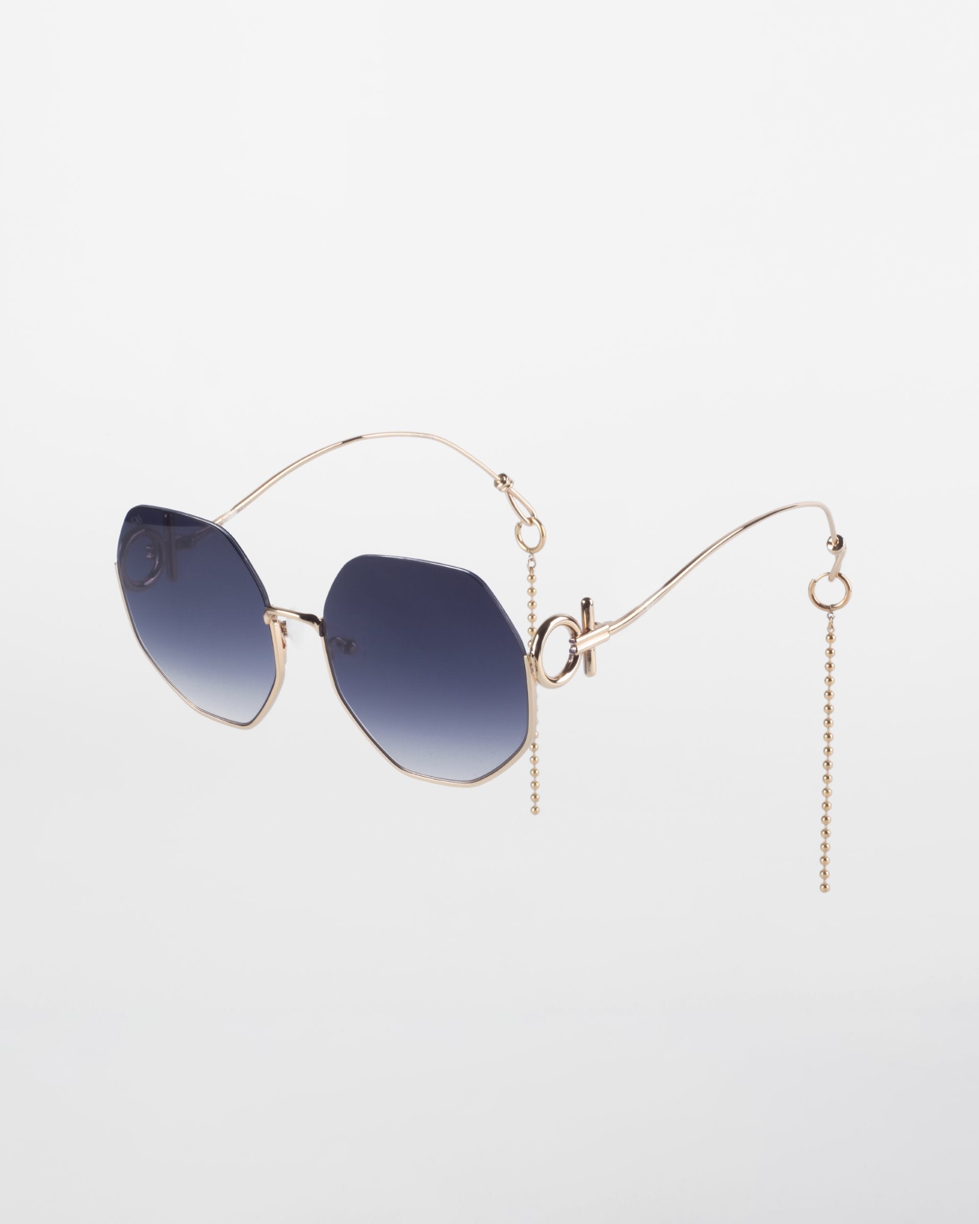 Stylish sunglasses with octagonal, gradient lenses and 18-karat gold-plated frames featuring unique, curved temples and chain accents on a plain white background. Limited Edition Palace by For Art's Sake®.