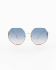 Front view of Palace sunglasses by For Art's Sake® with gradient blue lenses and thin 18-karat gold-plated frames. The arms of the sunglasses are also gold, with white earpieces. These UVA & UVB-protected sunglasses are Limited Edition. The image has a clean white background.