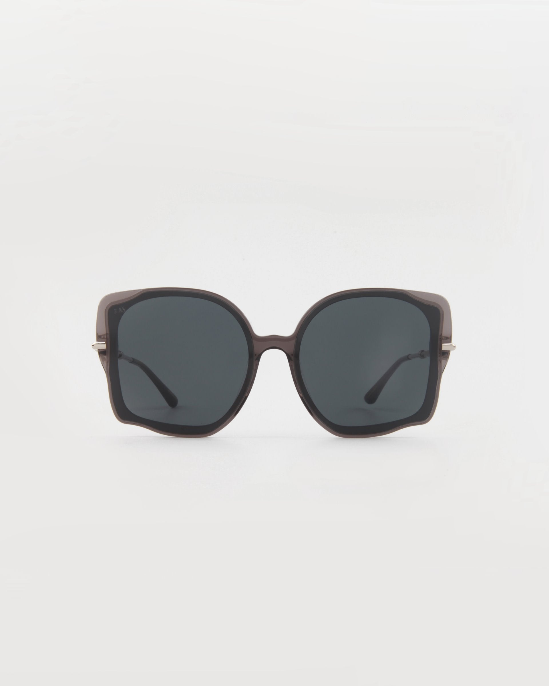 A pair of oversized, handmade acetate sunglasses featuring square-shaped, dark brown frames and dark-tinted lenses with 18-karat gold-plated arms, displayed against a plain white background. This is the Fahrenheit by For Art&#39;s Sake®.